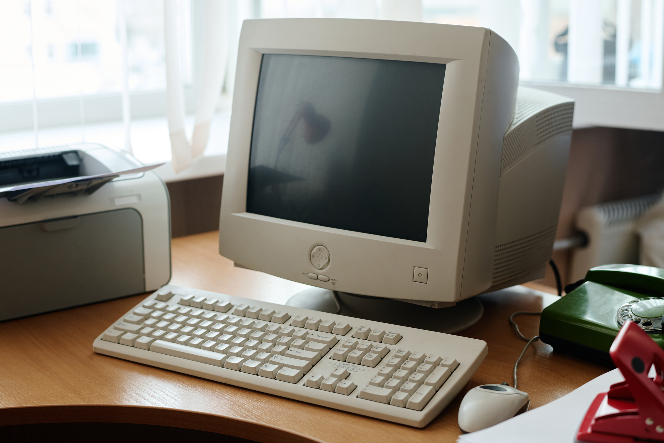 Old computer monitor and keyboard. 