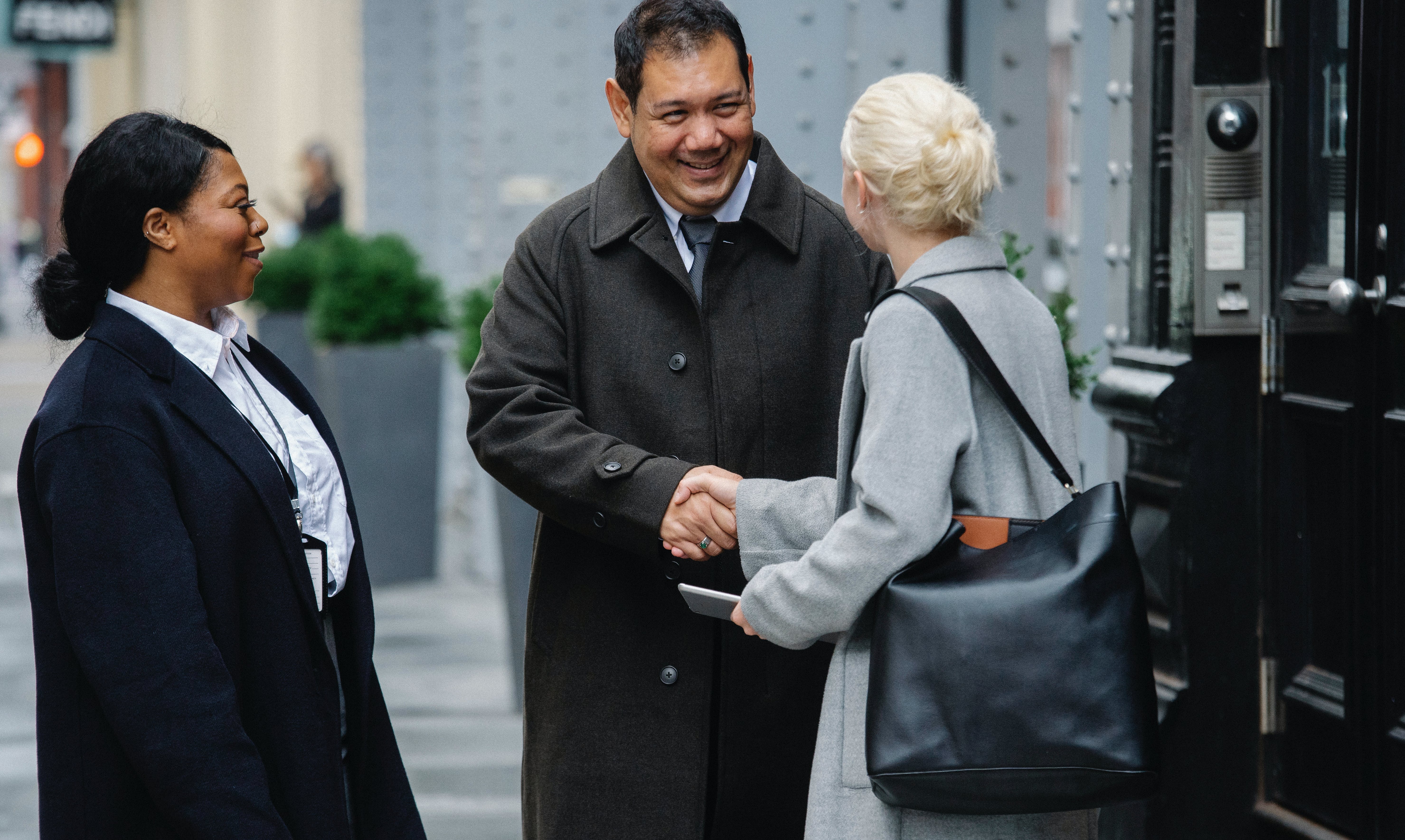 Business leaders meeting and shaking hands.